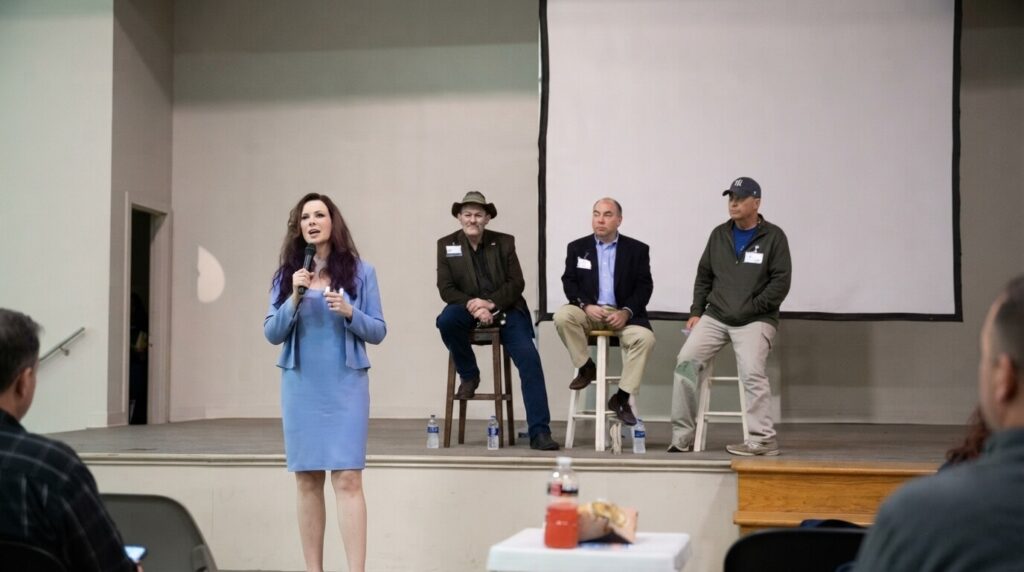 Attendees listening to a speaker at a real estate investing seminar near Nashville