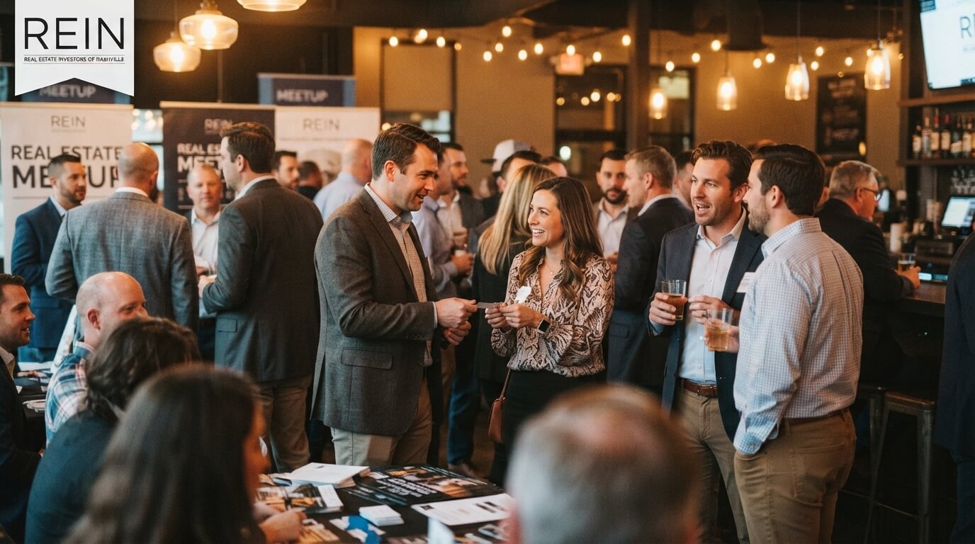 Investors networking to build a buyer list at a Nashville real estate meeting
